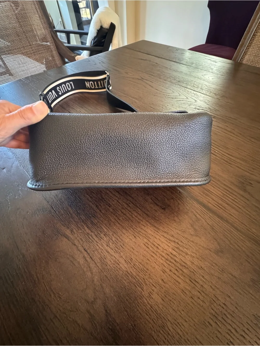 Brand new Louis Vuitton Black Buci bag with 2 Louis Vuitton straps.